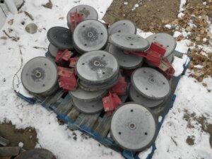 White planter closing wheels-image