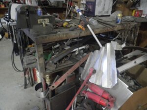 2ft by 5ft metal shop table with vise-image